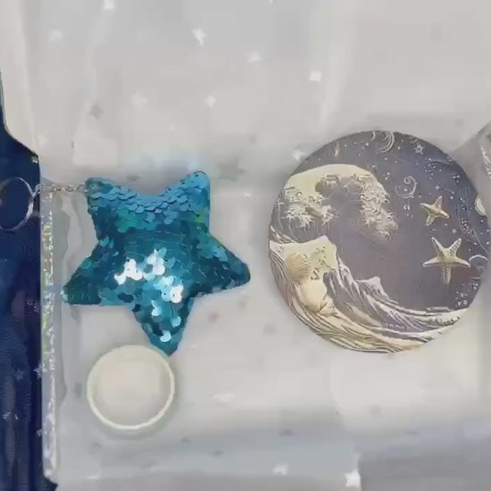 Mermaid Gift Box. Mermaid and ocean themed surprise box filled with 10+ gift items. Ideal gift for a girl who loves mermaids!